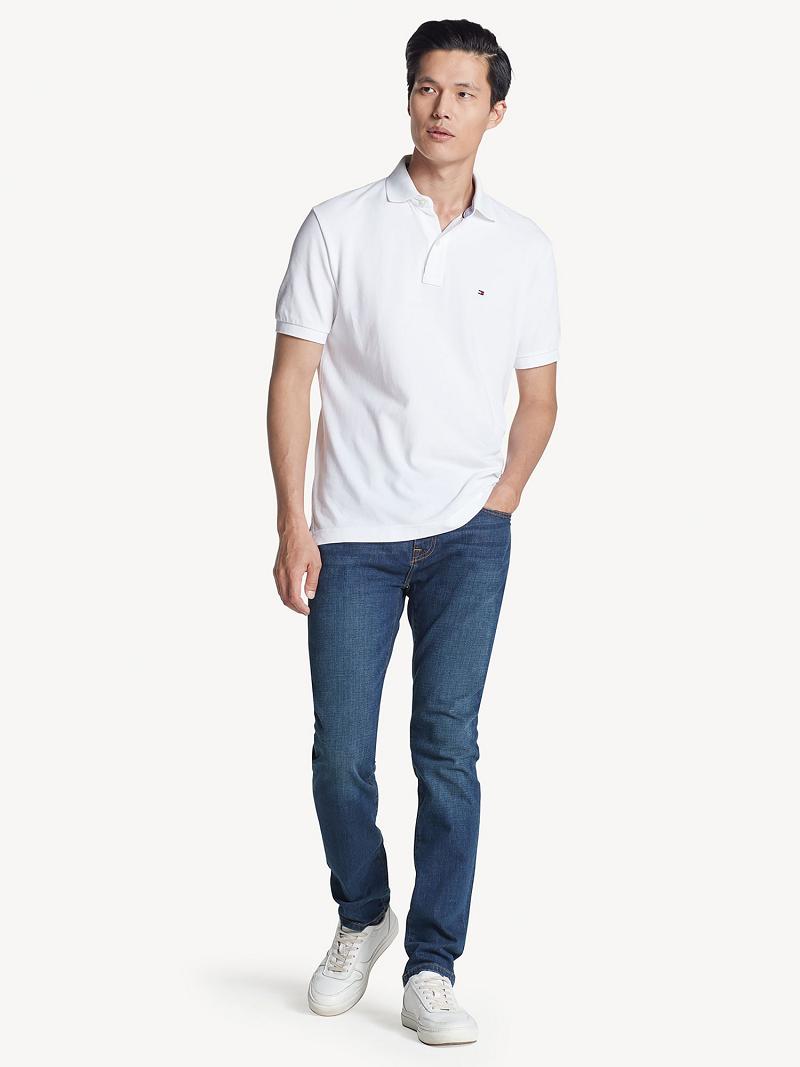 Polos Tommy Hilfiger Classic fit solid Blancos | MX_M31289